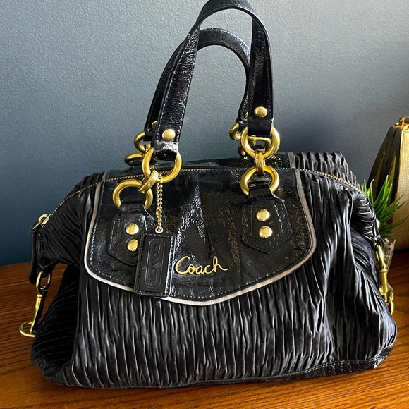 Coach Handbags - Beautiful COACH Black and Gold Accessories Canvas Purse